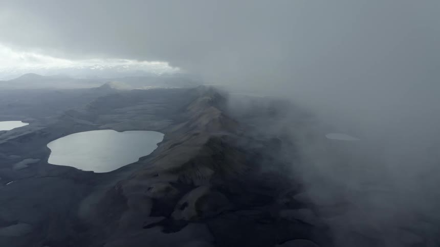 Dense fog covering the rocky landscape