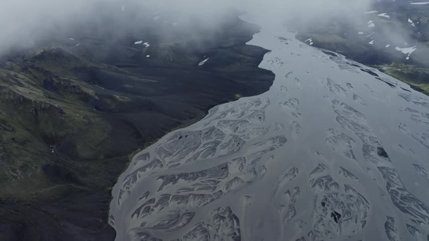A river near plains and moutains