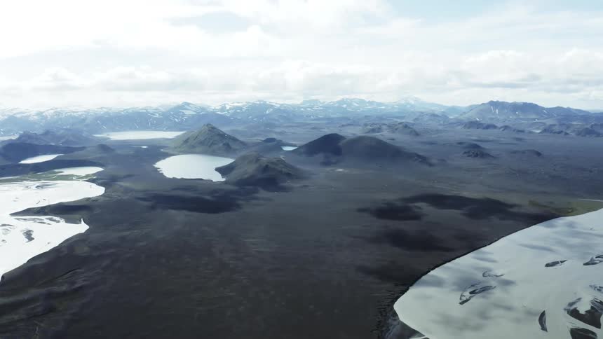 Aerial panorama of craters with lakes amid mountains