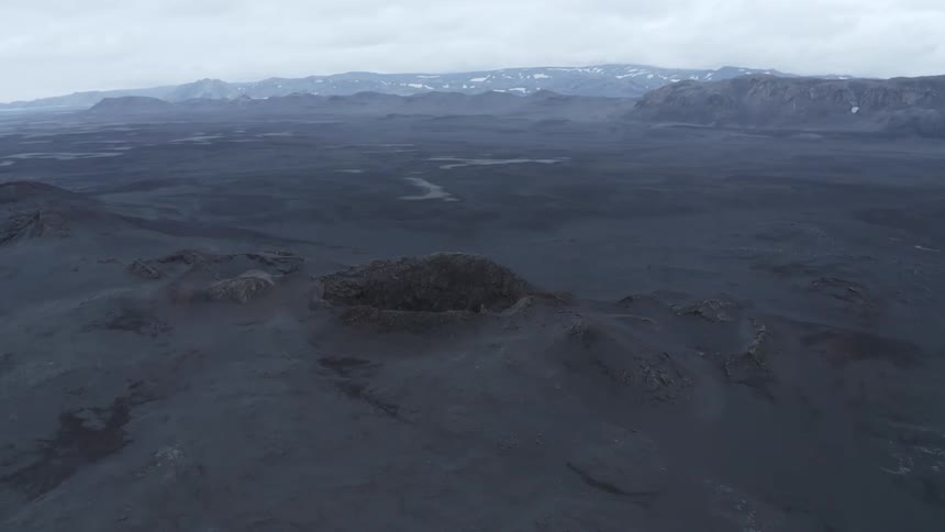 Mountainous landscape with valleys on a cloudy day