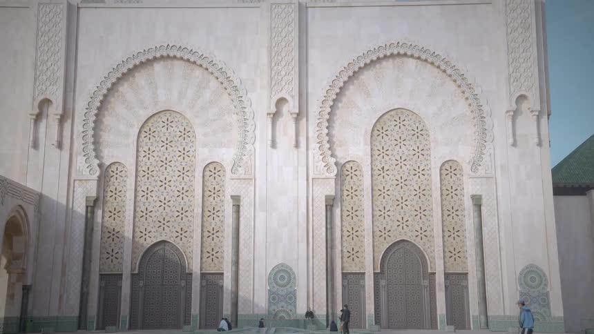 Worshippers gather outside of a mosque