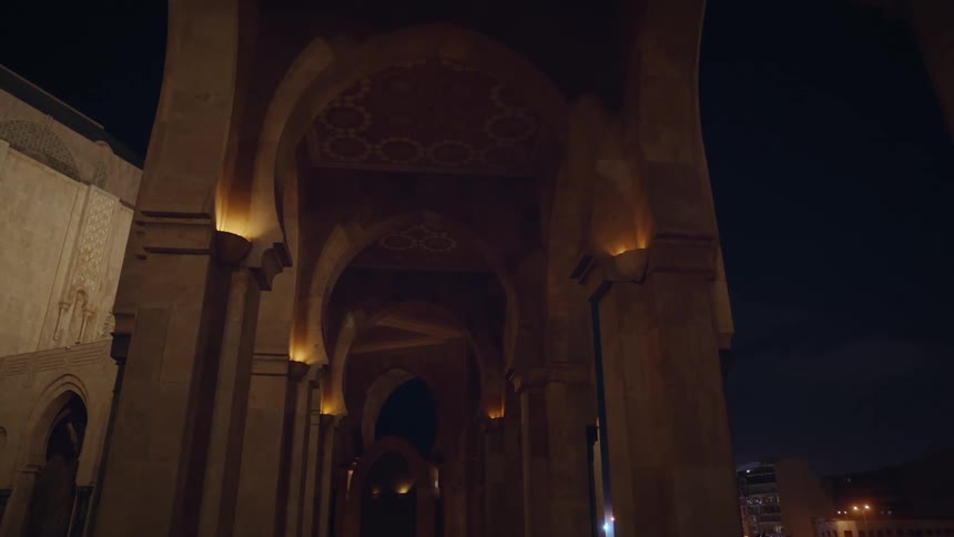 An empty church at night time near a city