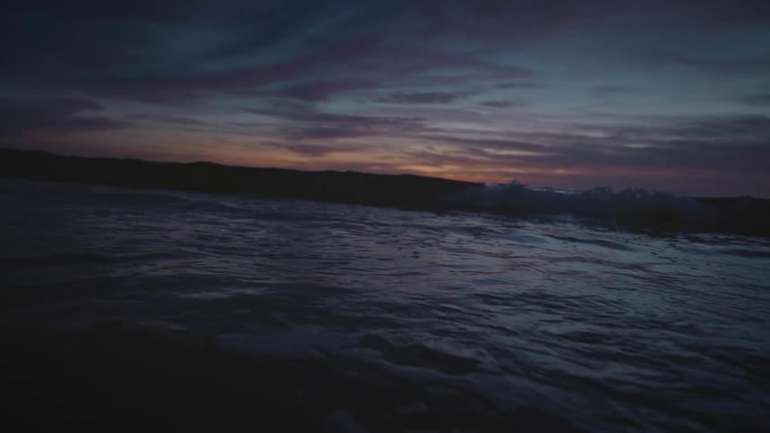 Ocean waves while the sun is going down