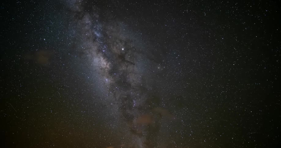 The milky way glows in the night sky