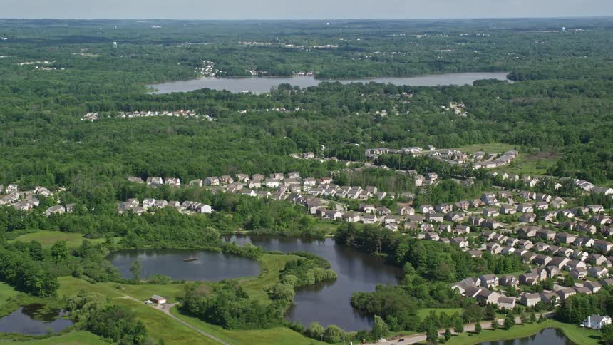 A large suburban area with lakes near more rural areas