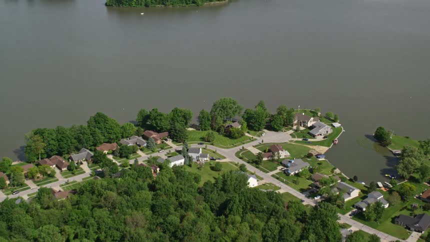 Aerial panorama of a residential neighborhood by a river