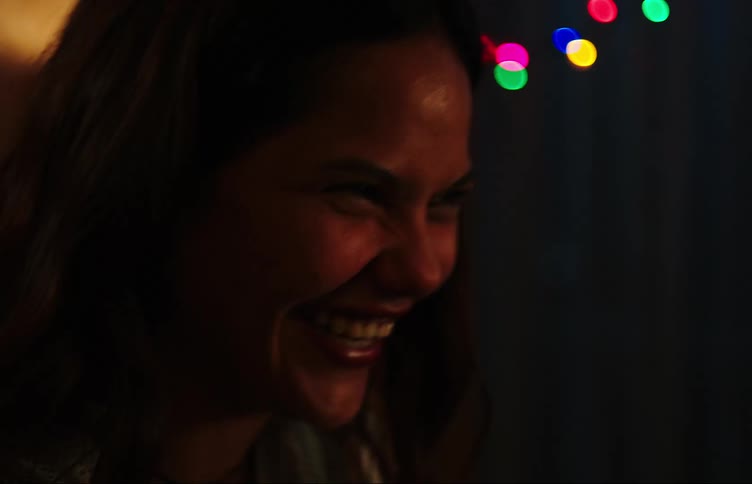 A young woman laughs