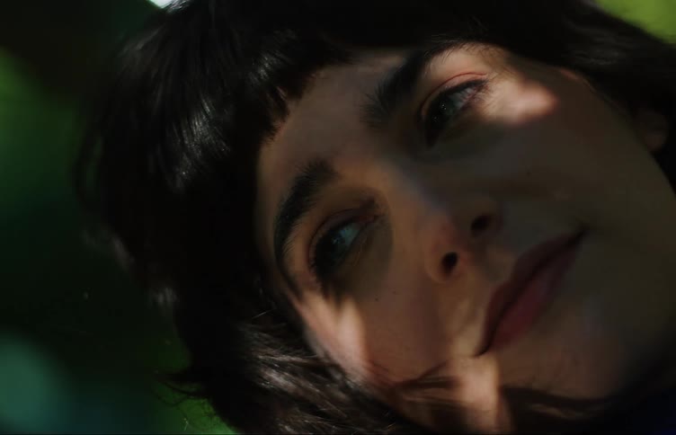 A close up clip of a female smiling