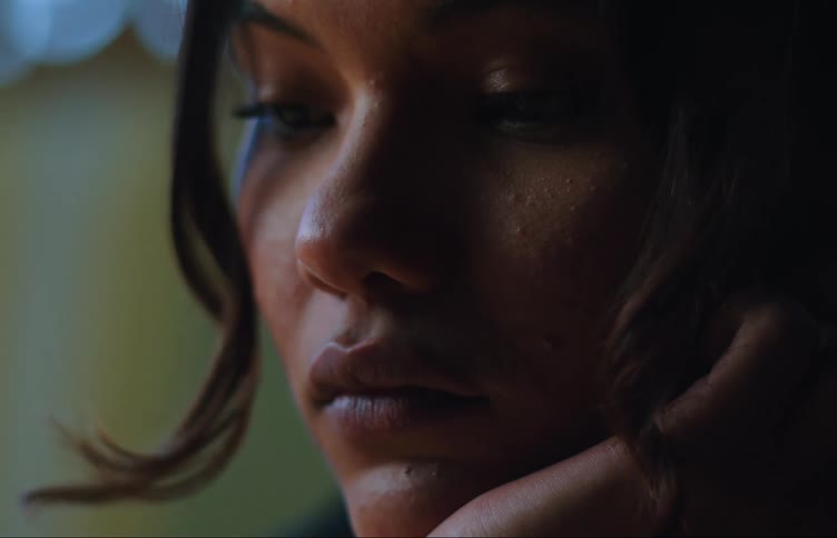 The face of a contemplativeyoung woman