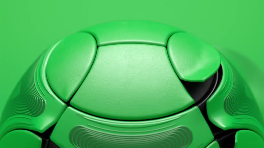 Green layer covering ball floats off to reveal black surface layer