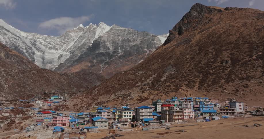 A developing city at the foot of a mountain range