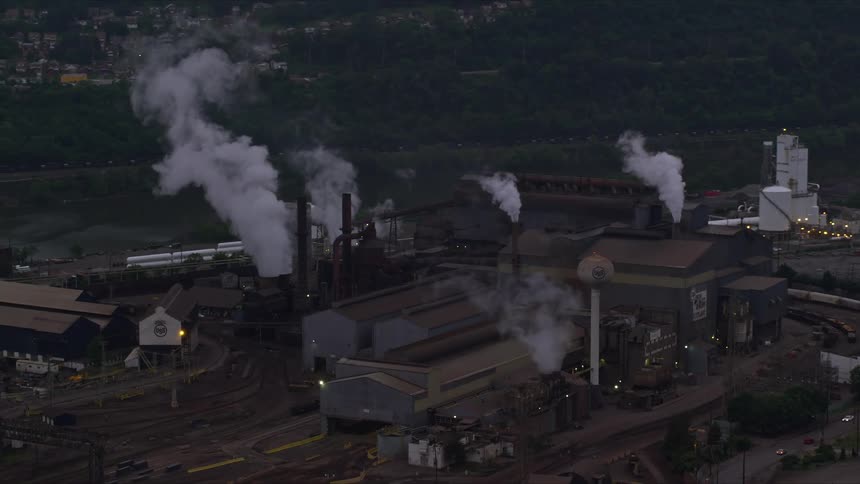Aerial panorama of a factory with smoke stack
