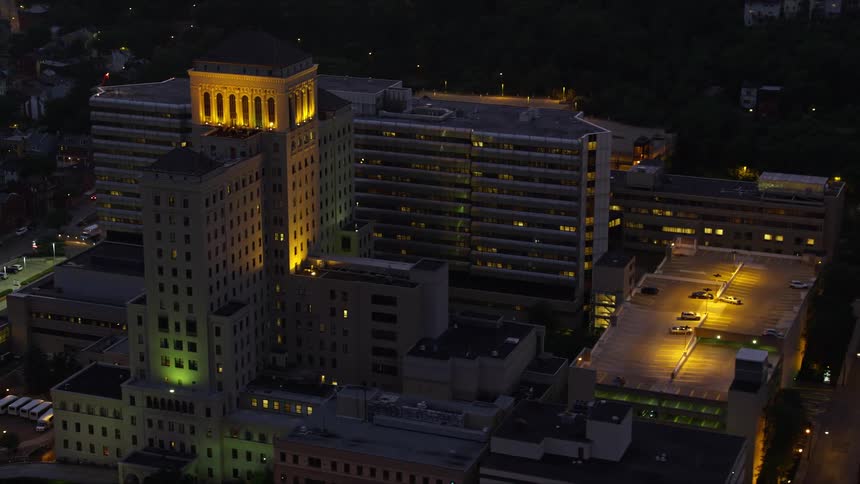 Aerial view of a building complex with a tower block