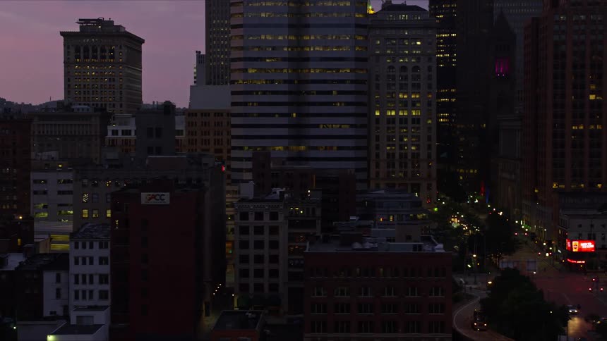 The sun is setting on the city