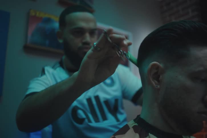 A barber cutting hair