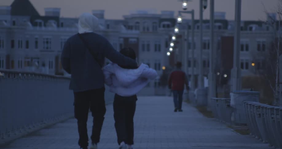 People are walking on the boardwalk