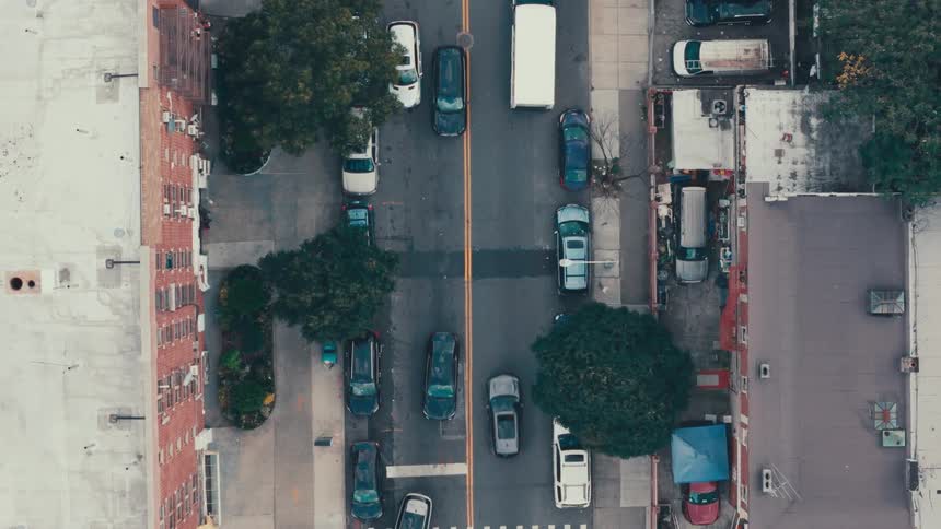 Top view of a street with vehicle traffic in an urban perimeter