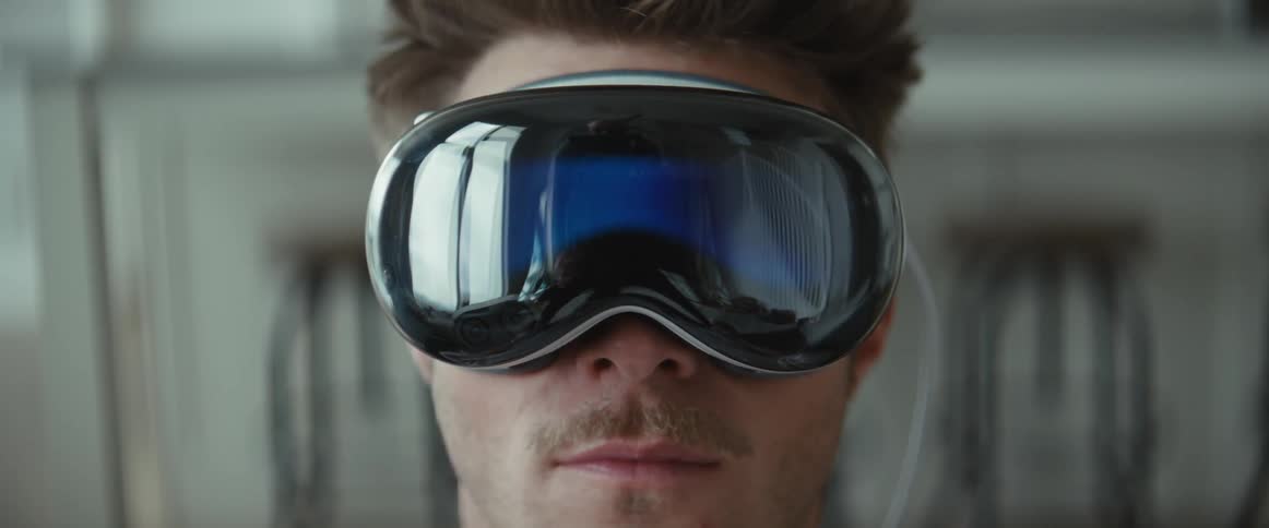 A man wearing vision pro vr glasses