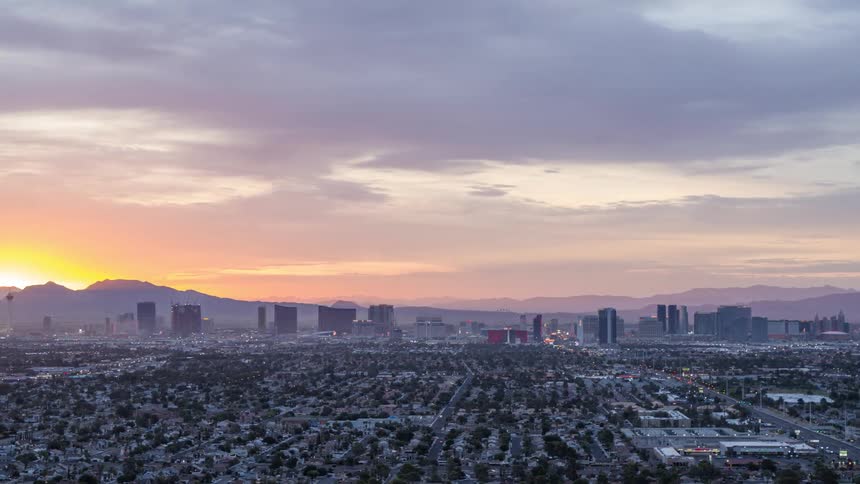 Suburbs and a city center sit in an enormous valley