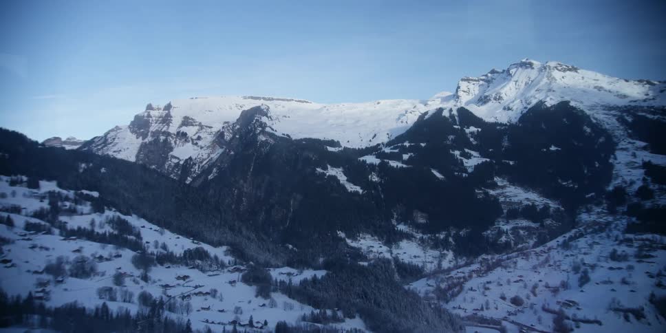 Buildings in a rural mountain valley