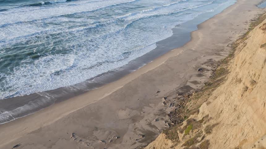 Waves wash in on a beach