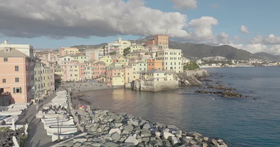 Panorama of an urban city with old architecture buildings by the sea on a cloudy day