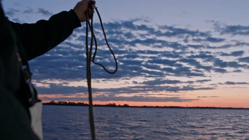 Two fisherman on a boat
