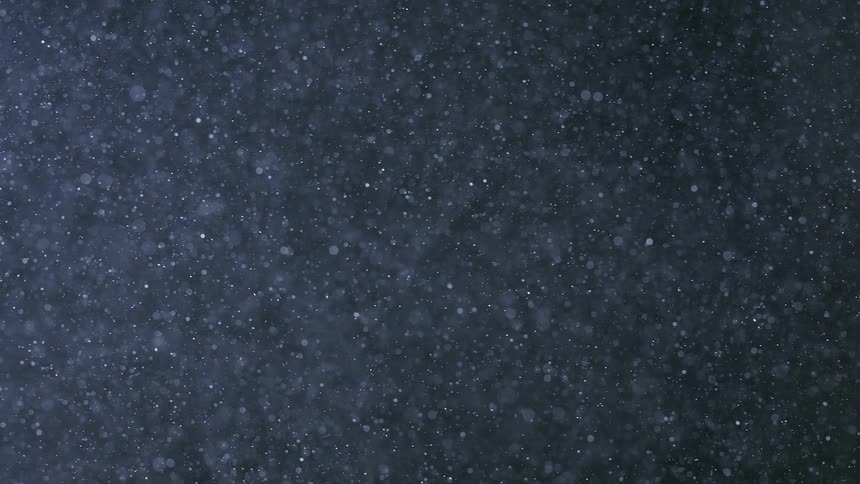Snowflakes move through the sky