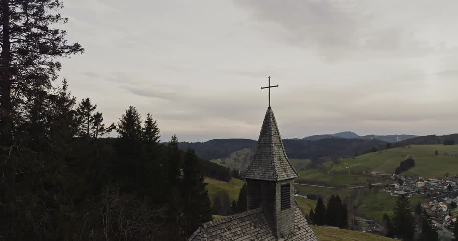 A church is on the hill above the town