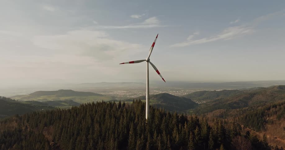Moving wind power tower on a mountain peak