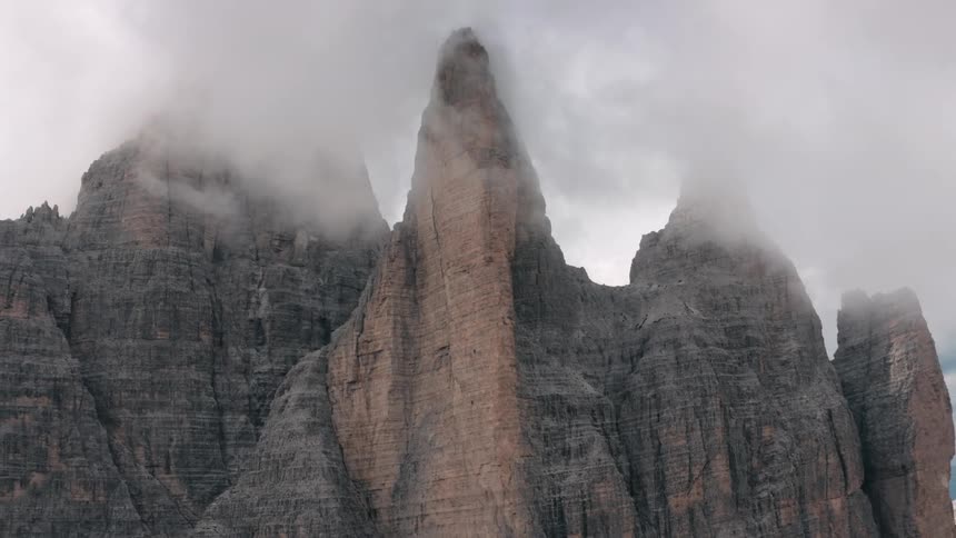 Clouds cover the tops of a mountain range