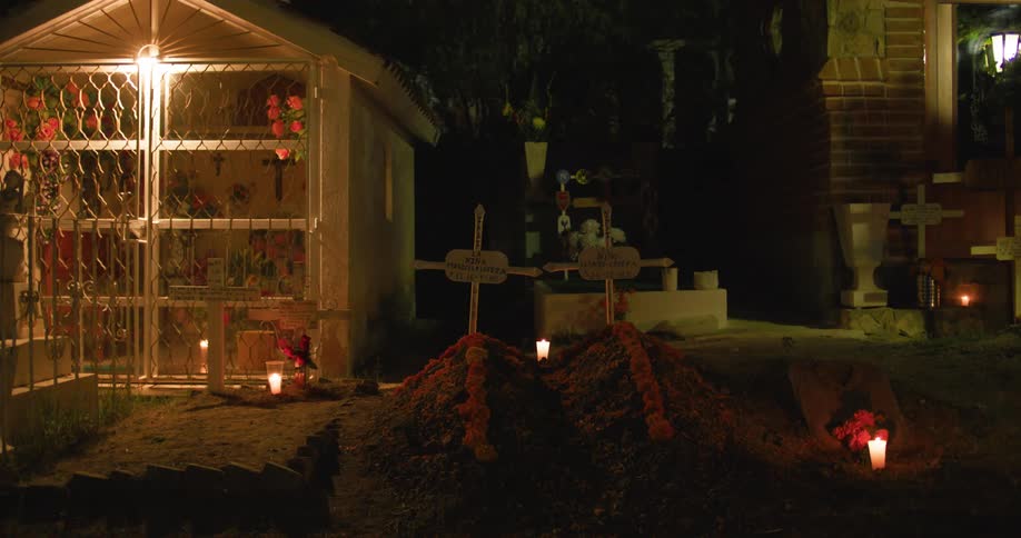 Someone runs through the cemetery at night