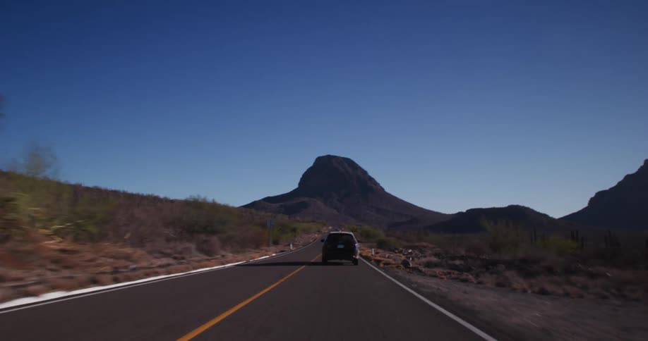 A vehicle is driving down the highway