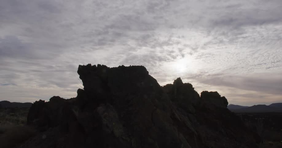 A mountain peak juts upward