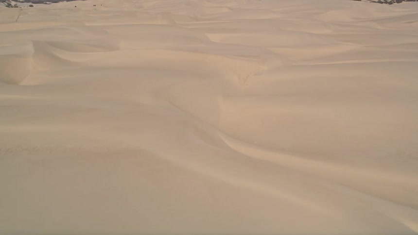 Aerial view of white sand dunes in the desert