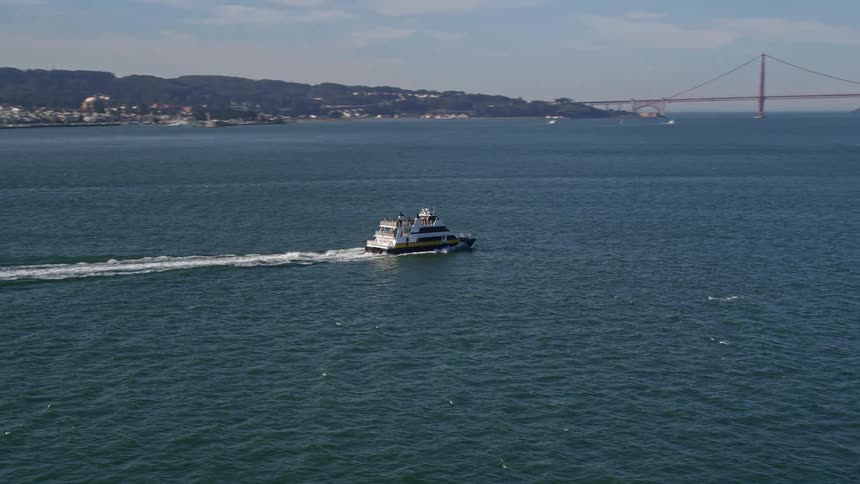 A yacht heads out into san francisco bay