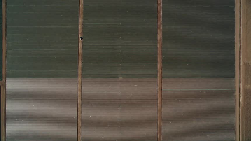 Suburbs give way to solar panels and a rural agricultural area