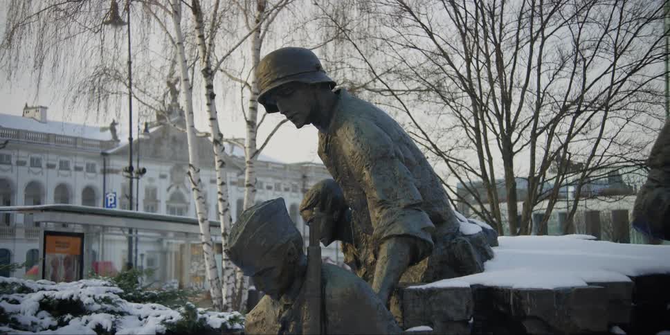Three fighters escaping through the sewer system at the Monument to the Warsaw Uprising in Poland