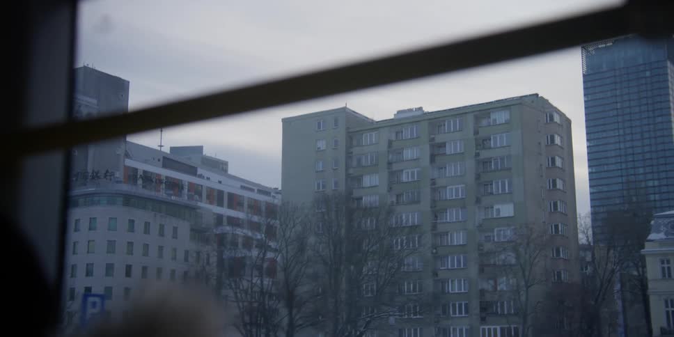View from inside a bus of residential and commercial buildings in Warsaw, Poland