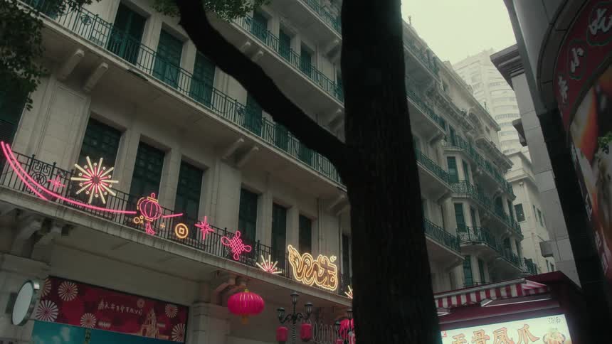 A building with a decorated balcony