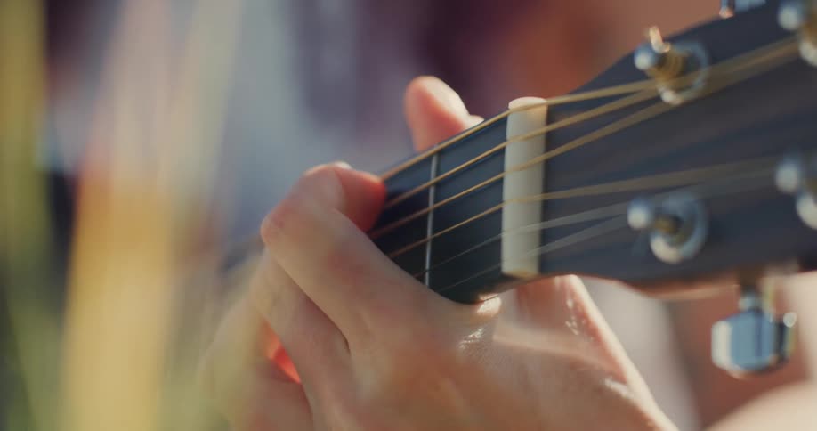 A person is playing the guitar