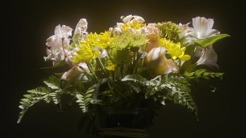 Vase with blooming white and yellow flowers