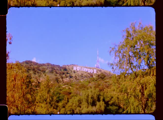 Panorama of the hollywood sign in the mountains on a blue sky day