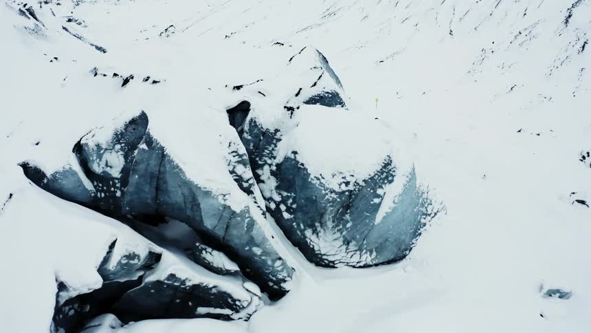 Aerial view of icebergs under snow