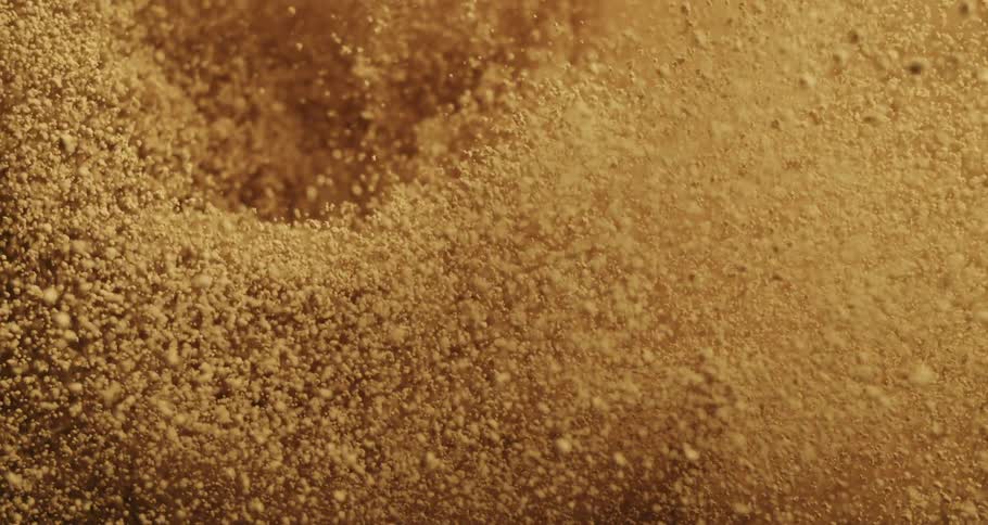 The sand explodes and lands
