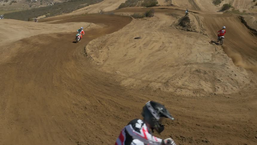 A motorbike race on a dirt path