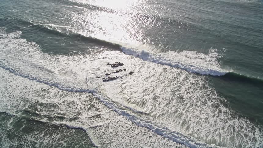 Ocean tides sweep into a shoreline