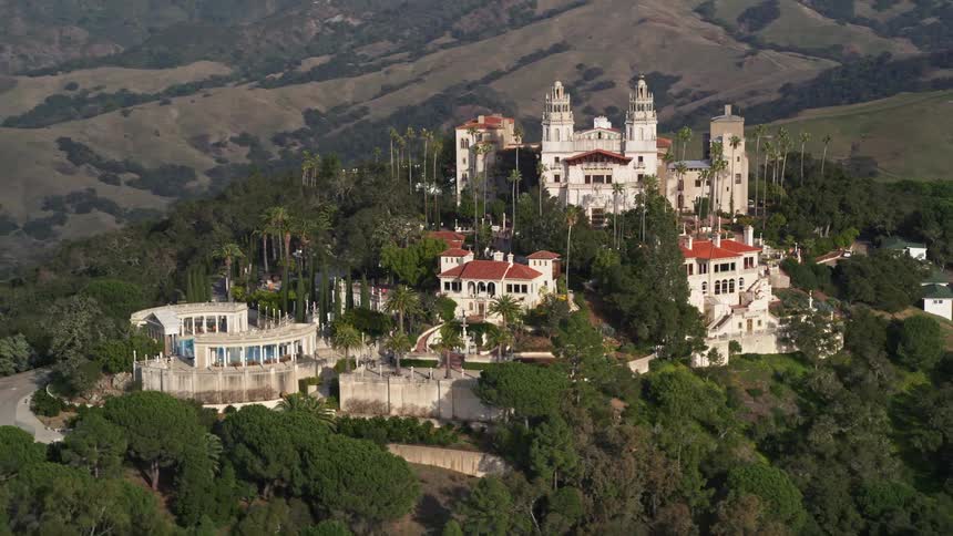 Aerial panorama of a cathedral on a mountain peak