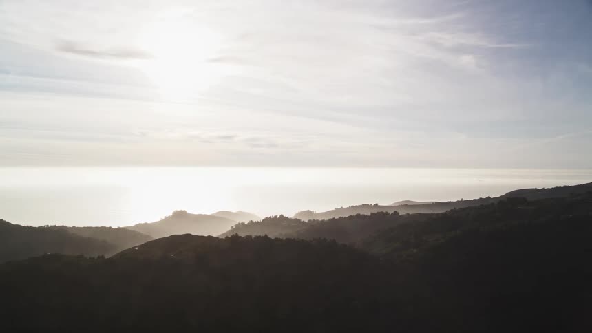 The mountains are covered in shadow