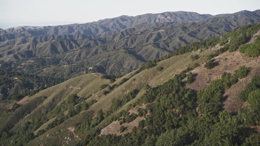 The mountains are covered with green
